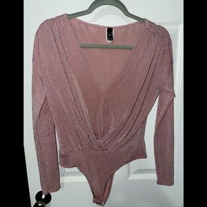 Cute glittery Body suit! Great for New Year’s Eve or date night.